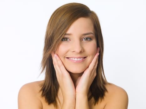 Portrait of beautiful young woman on white background