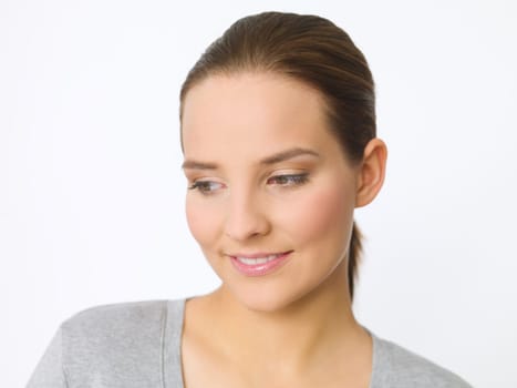 Portrait of beautiful young woman on white background