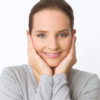 Portrait of beautiful young woman on white background