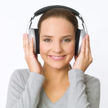Portrait of beautiful young woman with headphones