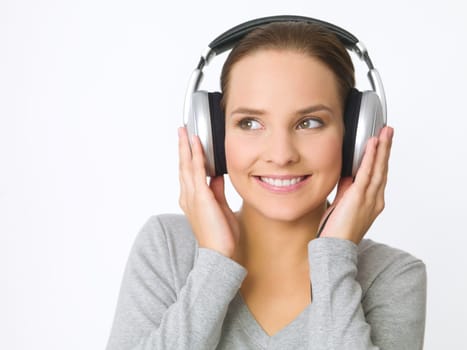 Portrait of beautiful young woman with headphones