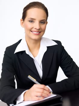 Portrait of beautiful and young business woman working at the desk