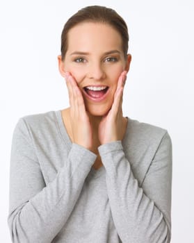Portrait of beautiful young woman showing surpise gesture