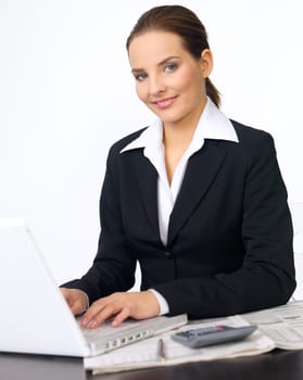 Portrait of beautiful and young business woman working on laptop