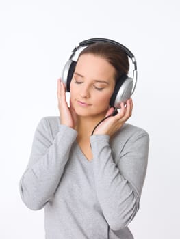 Portrait of beautiful young woman with headphones