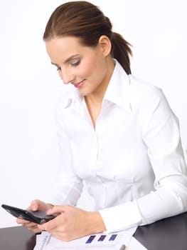 Portrait of beautiful and young business woman using cell phone