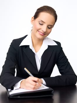 Portrait of beautiful and young business woman working at the desk