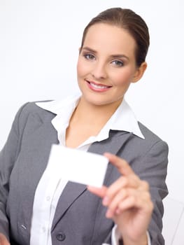 Portrait of beautiful and young business woman holding empty card