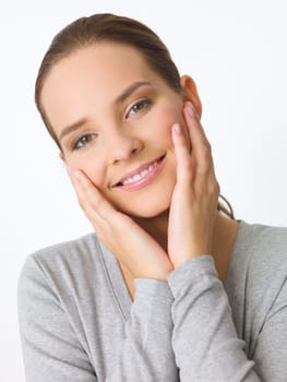 Portrait of beautiful young woman on white background