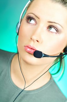 Beautiful young woman working as Call Center operator