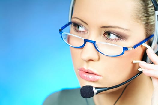 Beautiful young woman working as Call Center operator