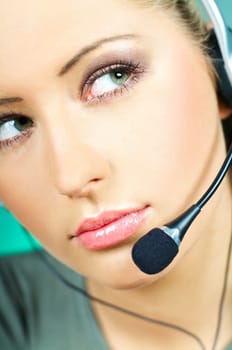 Beautiful young woman working as Call Center operator