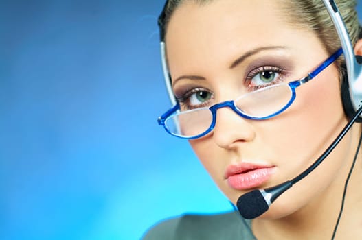 Beautiful young woman working as Call Center operator