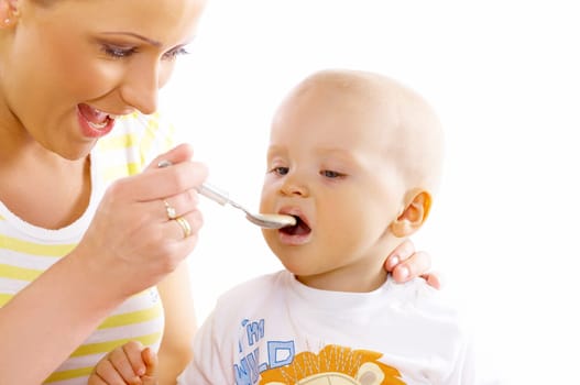 Young attractive mother with cute little baby
