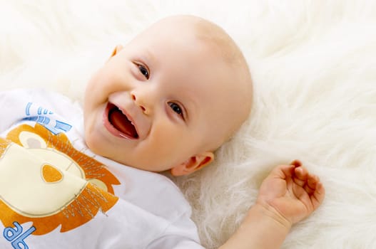 Portrait of sweet little baby boy on white background