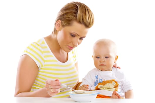 Young attractive mother with cute little baby
