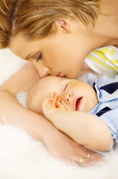 Young attractive mother with cute little baby