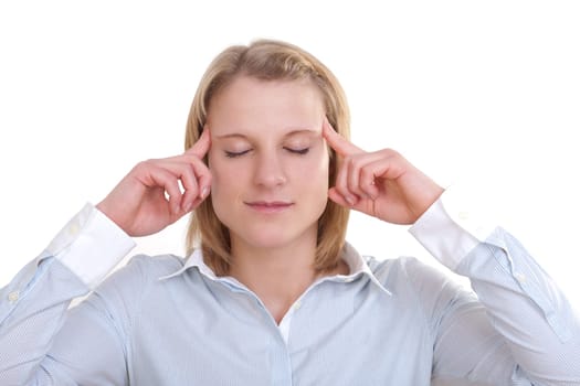 Young blonde woman with closed eyes holding her fingers to her temples
