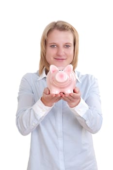 Young blonde woman holding a piggy bank with both hands