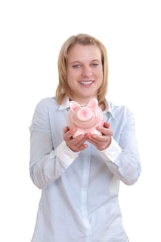 Young blonde woman holding a piggy bank with both hands