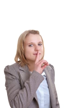 Speech ban - Young woman holds her index finger to her lips