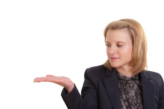 Young elegantly dressed woman looking at her open outstretched palm