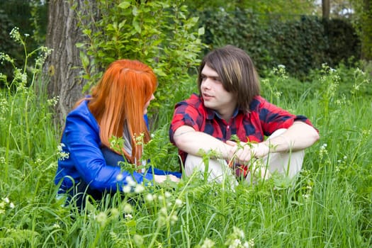 Portrait of love couple outdoor in park