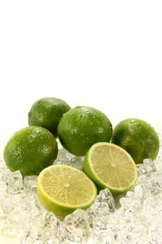 fresh limes on ice