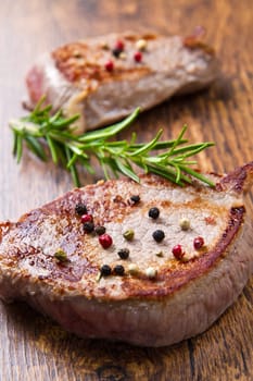 grilled meat fillet on wooden background