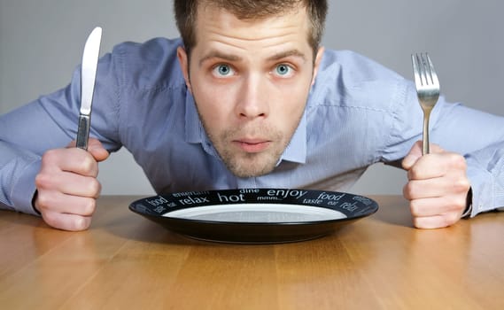 Hungry man wating to be served
