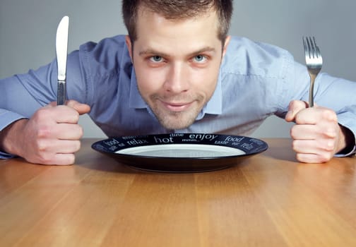 Hungry man waiting for dinner