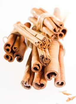 a group cinnamon sticks isolated on white. Different cinnamon sticks on white background.
