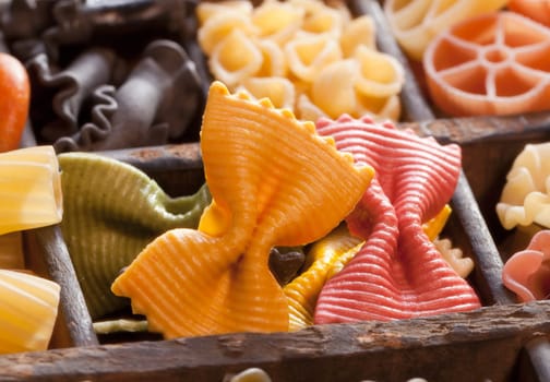 Different colored Pasta in an old letter-box