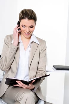 Face of young charming confident woman with headset