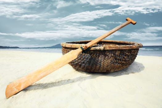 Vietnamese boat like basket near the ocean
