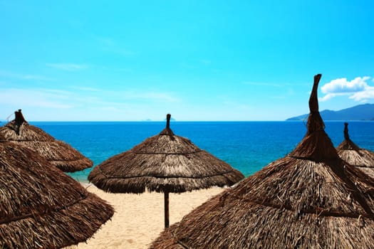 Top of beach umbrellas at sunny day