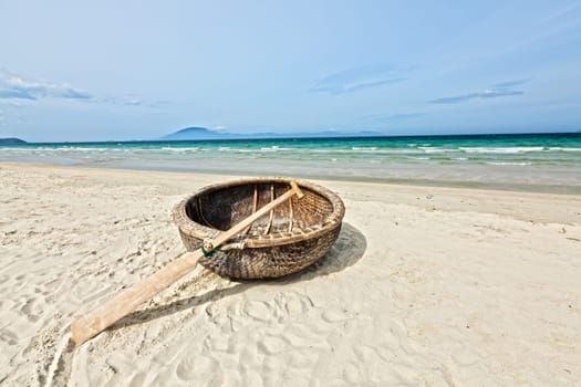 Vietnamese boat like basket near the ocean