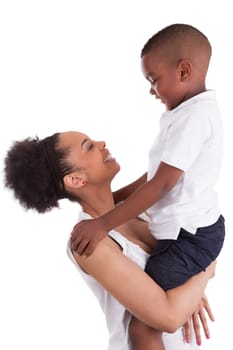 Litte black boy kissing her mother, isolated on white background
