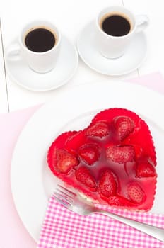 Heart Shaped Strawberry Cake and Two Cups of Coffee