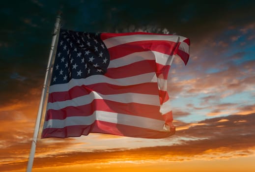 American flag on the background of beautiful sunset sky