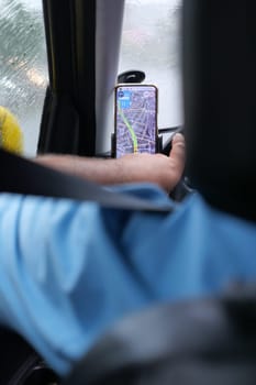 taxi driver using goggle map on smart phone ,