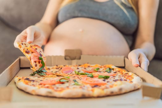 A pregnant woman enjoys a slice of pizza, savoring a moment of indulgence while satisfying her craving for a delightful, comforting treat. Excited Pregnant Young Lady Enjoying Pizza Holding Biting Tasty Slice Posing With Carton Box. Junk Food Lover Eating Italian Pizza. Unhealthy Nutrition Cheat Meal.