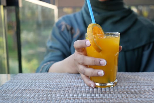 glass of orange juice outdoor ,