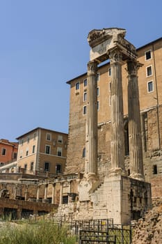 Temple of Vespasian and Titus in the Roman Forum. Tabularium and Portico of the advisory gods in the background