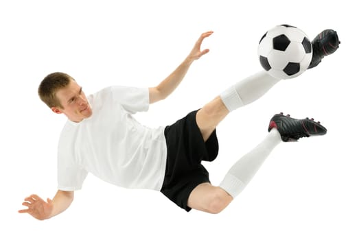 Isolated studio shot of a soccer player taking a overhead kick