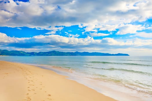 Gorgeous sandy tropical beach in sunny day