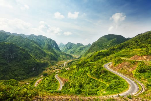 Mountain road in beautiful valley. Ha Giang province. Vietnam