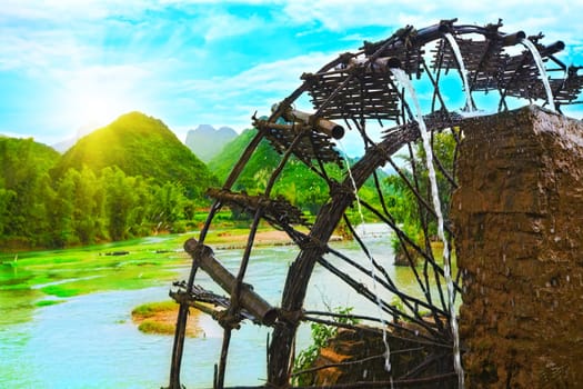 Bamboo water wheel. The use of water power for irrigation. Vietnam