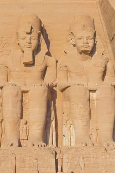Sculptures of King Ramses II and queen Nefertari in Abu Simbel Temple (Egypt)