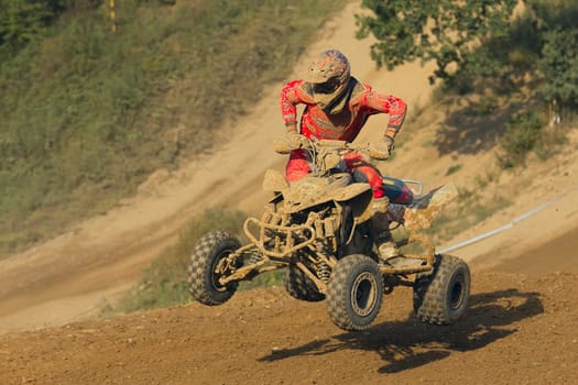 MOHELNICE, CZECH REPUBLIC - SEPTEMBER 17. Unidentified racer jump with a quad motorbike in the "Czech Republic Cup 2011"" on September 17, 2011 in the town of Mohelnice, Czech Republic."